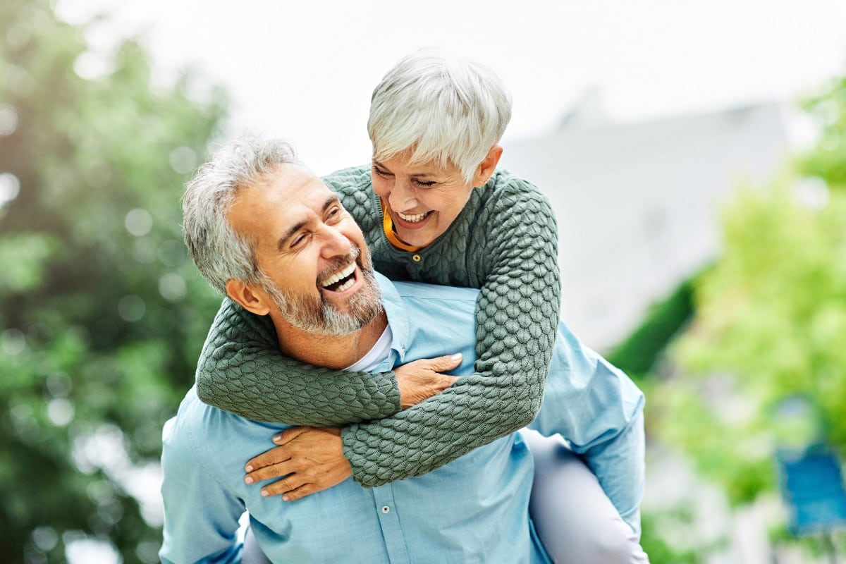 Reconstructive dentistry couple older smiling